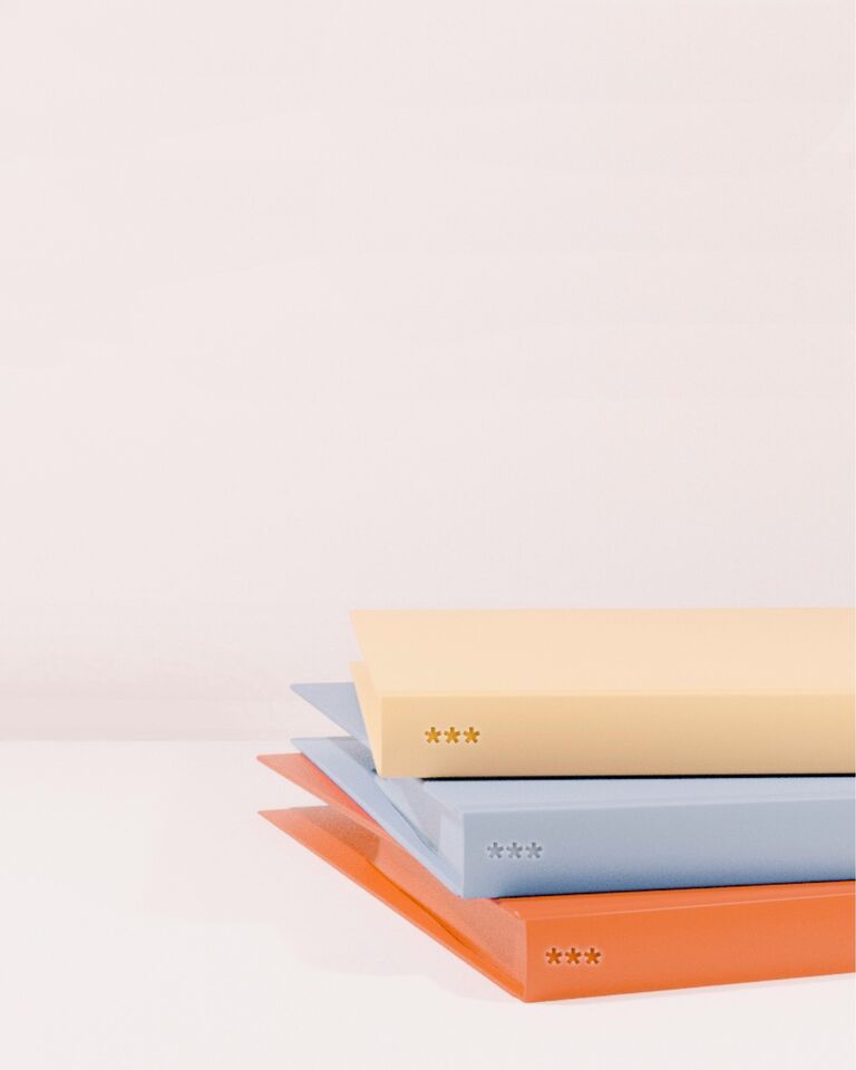 Pastel folders orgnaizing work.