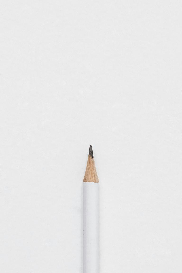 A pencil and background showcasing color theory